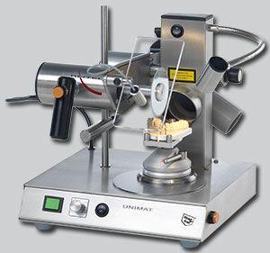 Unimat model-sav på rustfri stålbord